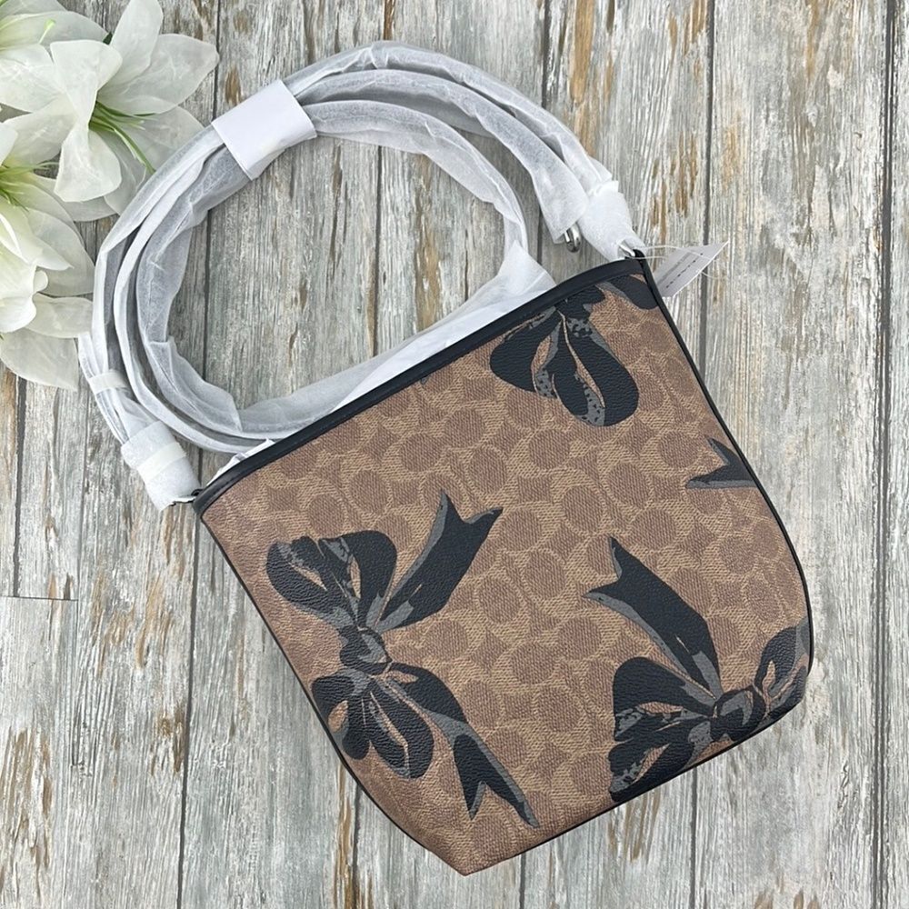 Coach City Bucket Bag Crossbody In Signature Canvas With Bow Print Purse